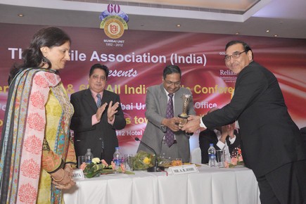 Mr. R. K. Vij, President, TAI, Delhi Unit receiving the Industrial Excellence Award by the hands of Chief Guest, Mr. A. B. Joshi