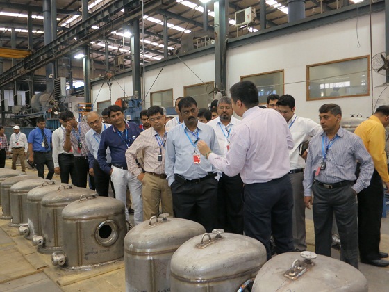 Mr. Amos Shek, FONG’S Area Sales Manager taking guests for the tour in FONG’S production plant.
