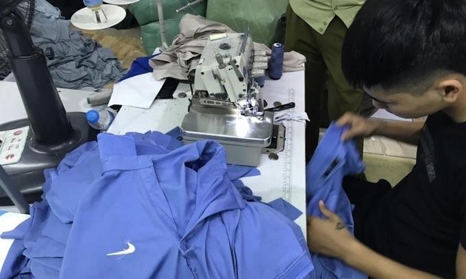 Fake branded T-shirts seized from a factory in Hai Duong, a highly industrialized province in the Hanoi Capital Region